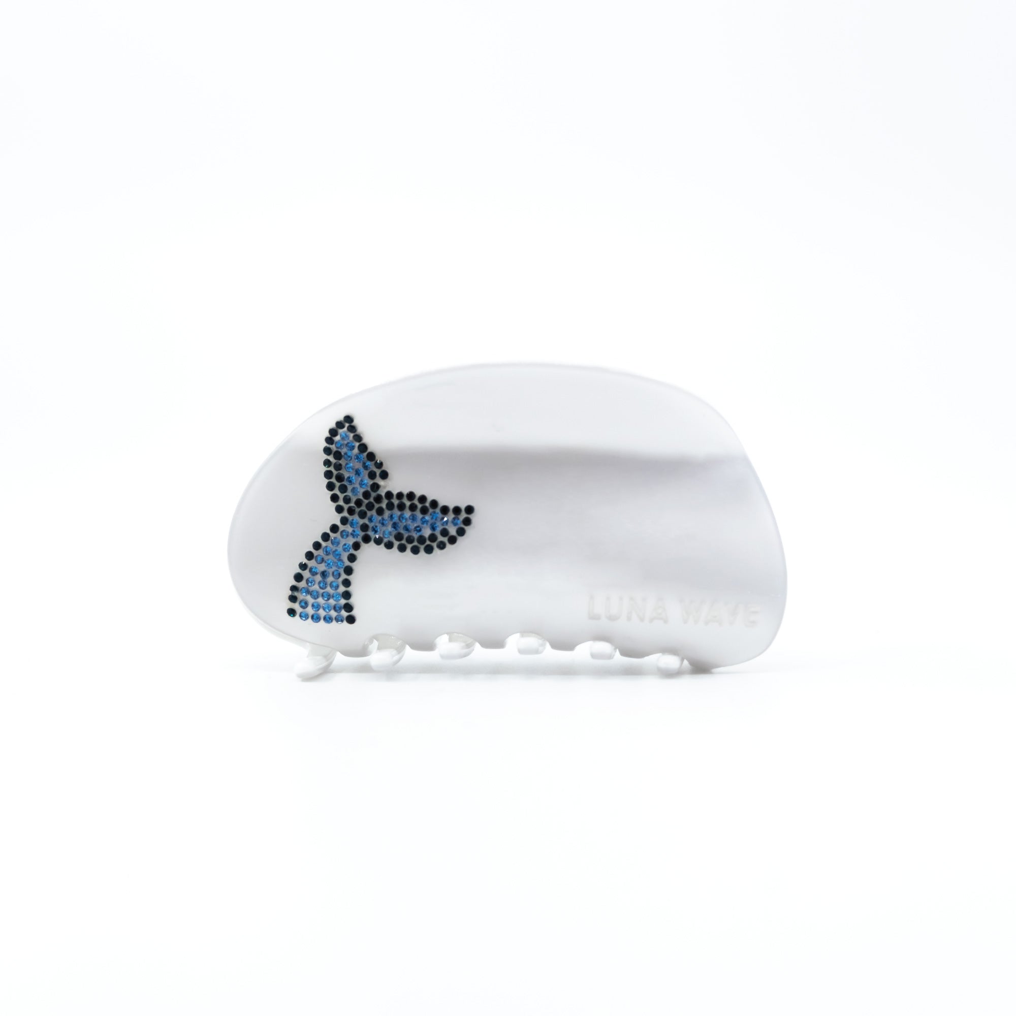 Eco-friendly acetate claw clip in white with rhinestone whale tail detail