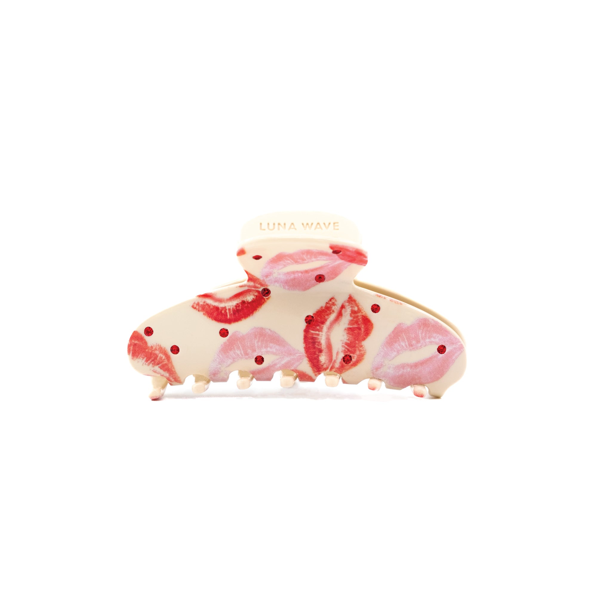 Rosy Claw by Luna Wave with red and pink lip print design and crystal accents on a cream base.