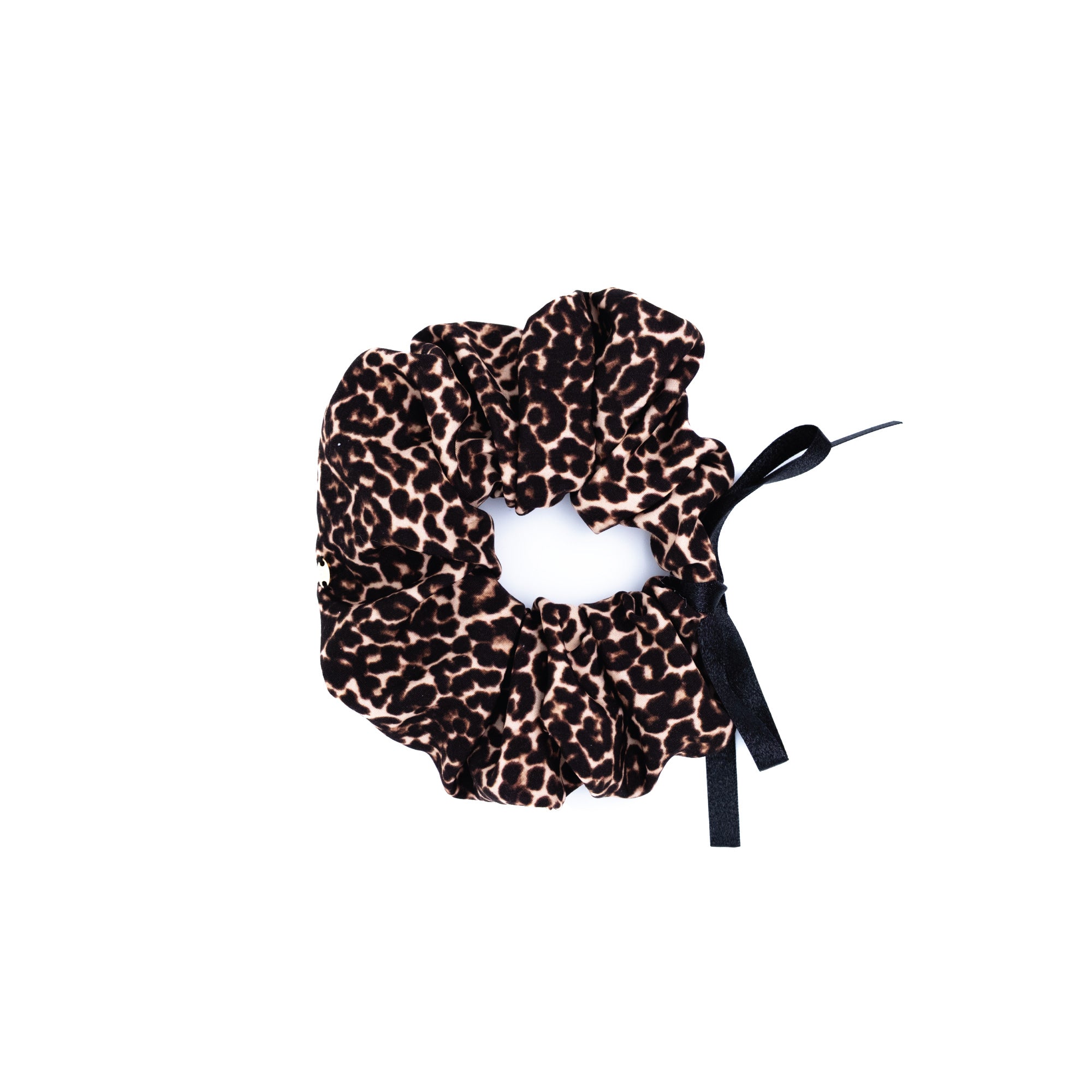 Leopard print fabric scrunchie with black ribbon bow by Luna Wave