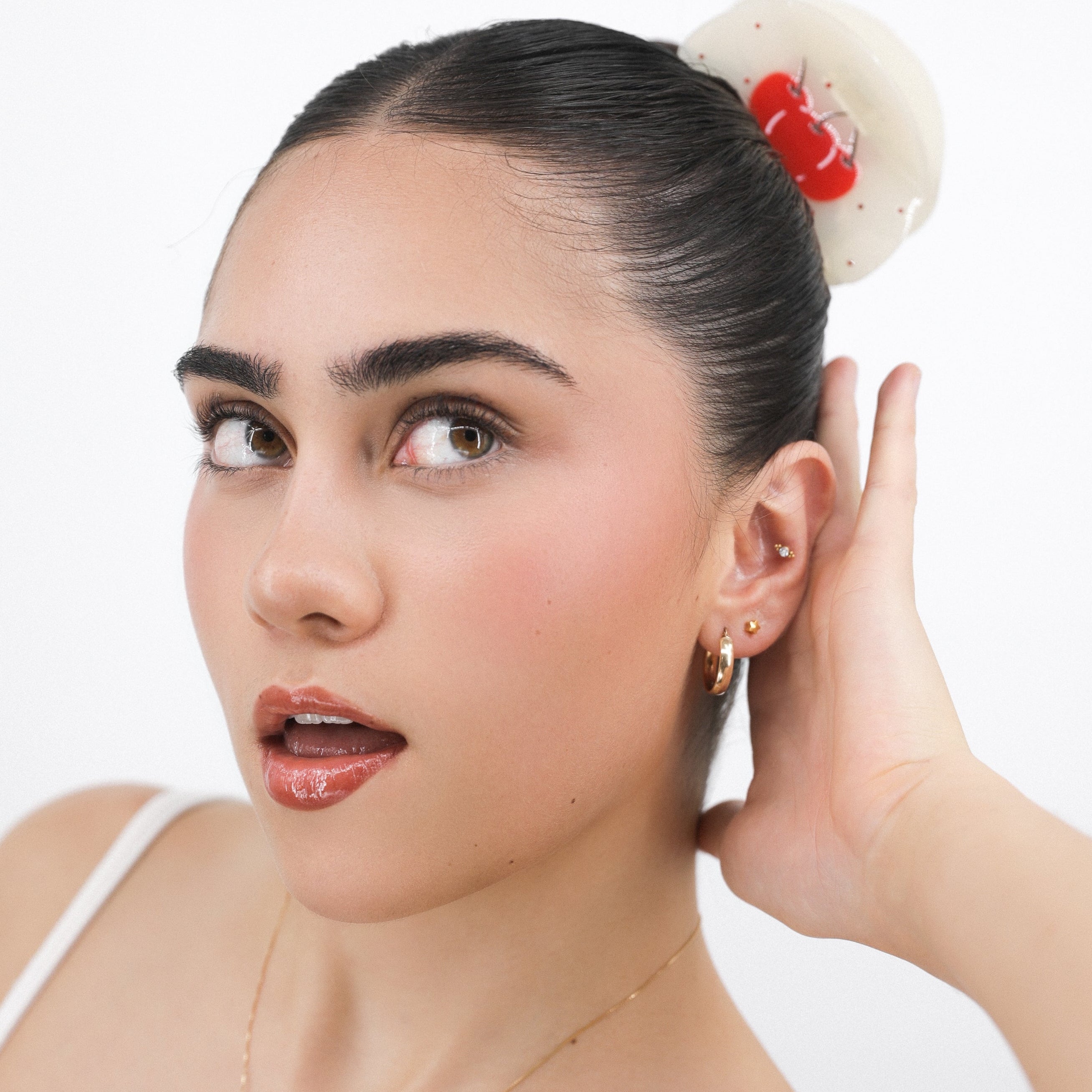 Woman with Luna Wave red cherry crush hair claw clip