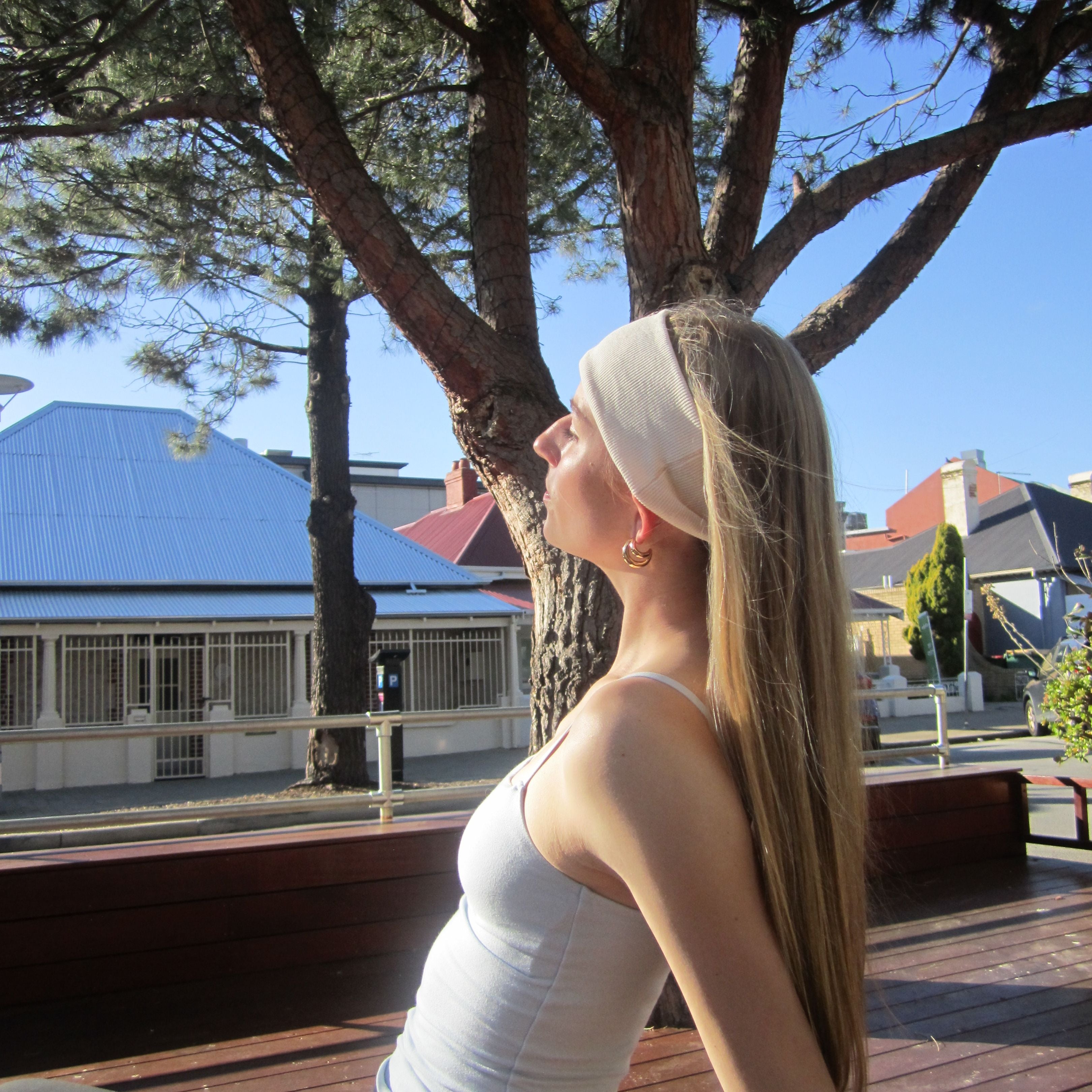 Model with long hair and luna wave creamy soft headband