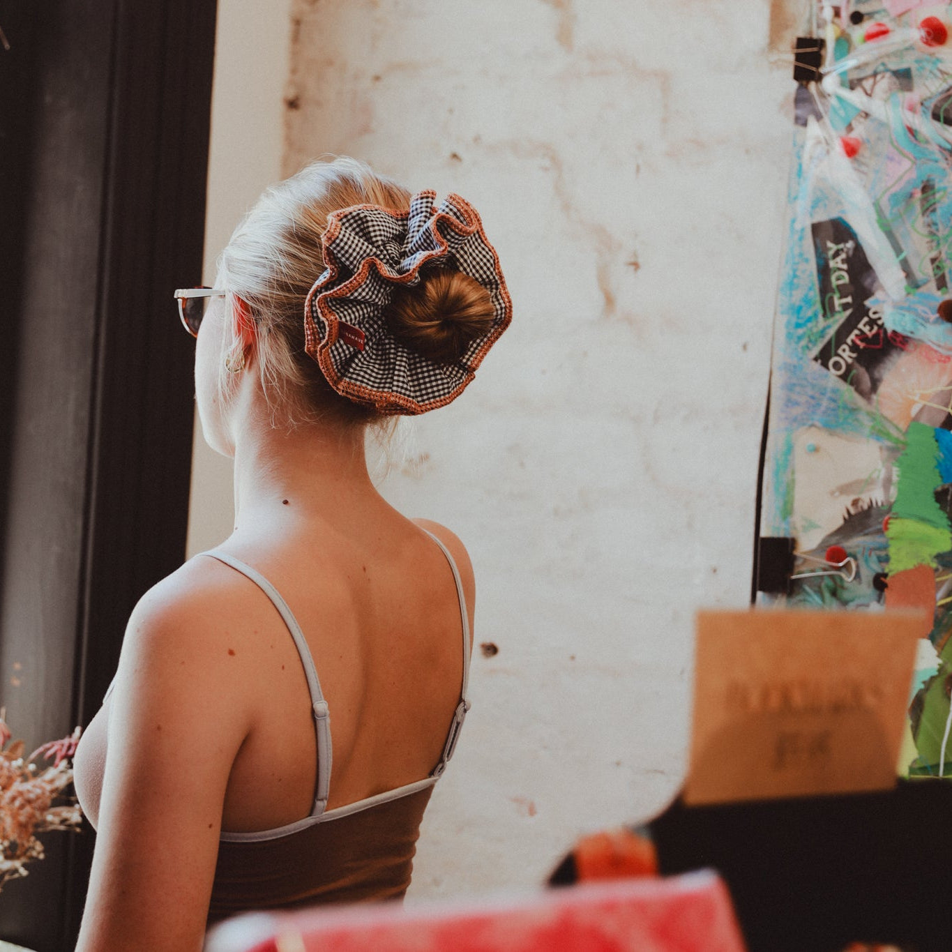 Woman with a luna wave darling-duo hair scrunchie 