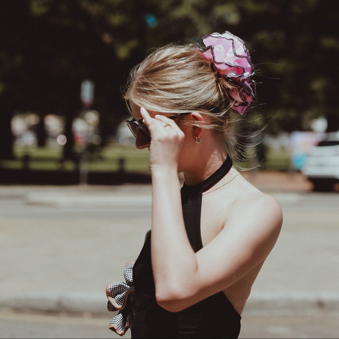 luna wave model with a pink darling duo scrunchies.