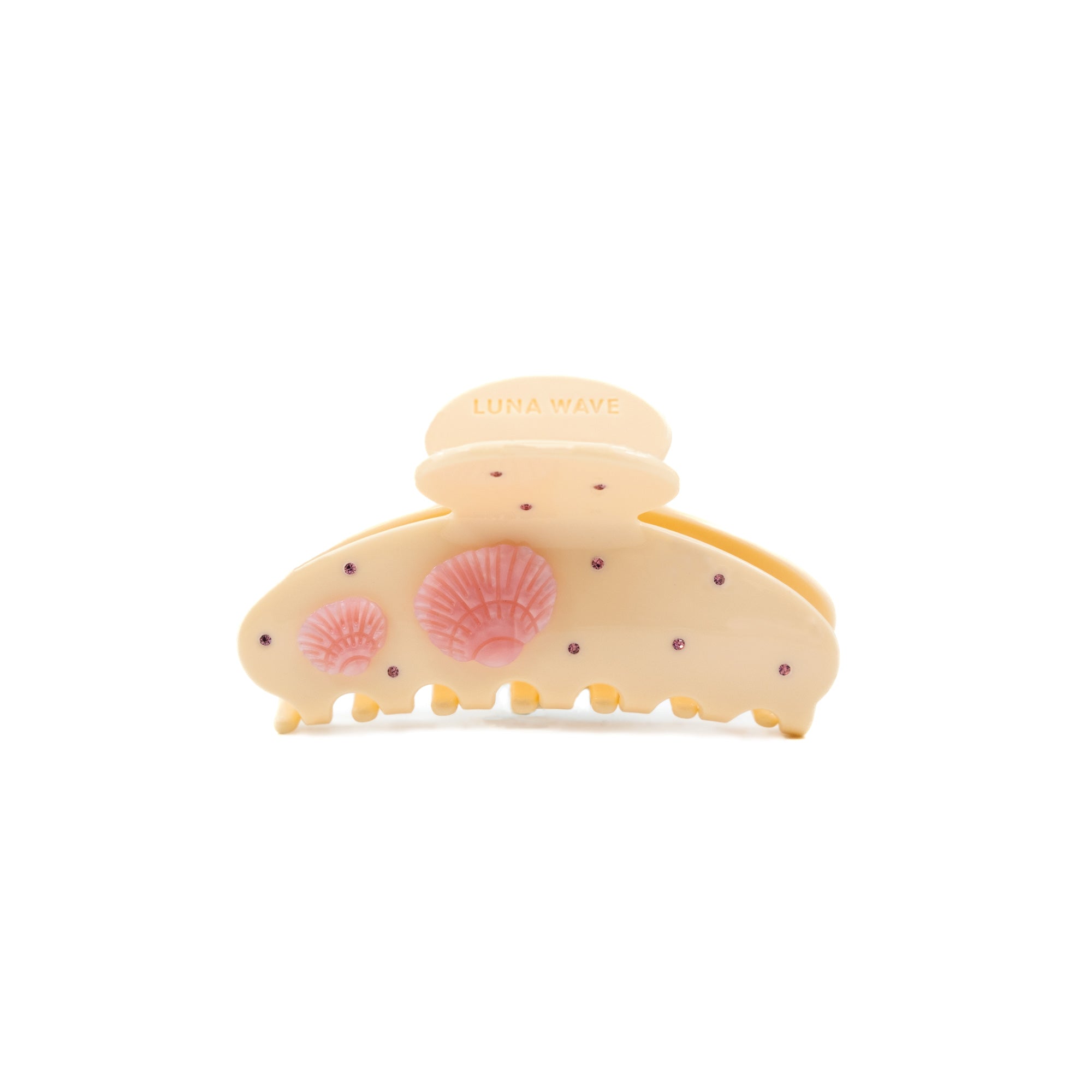 Beige hair claw with pink seashell details and rhinestone accents by Luna Wave