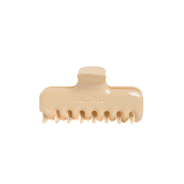 Luna Wave Jelly Claw in Butter, a glossy creamy yellow acetate hair claw clip with rounded edges.